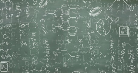 Image of mathematical and scientific drawings and formulae on blackboard