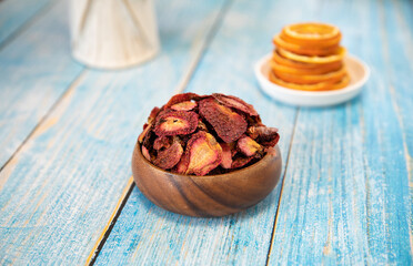 Dried strawberry fruits sliced chips on the table