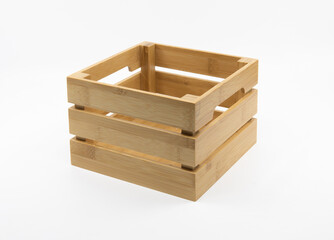 Wooden box or crate container isolated on white.