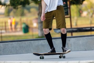 skateboarder doing his moves at a skateboard park