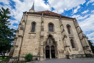 Fototapeta na wymiar Exterior of St Michael church in Cluj Napoca city in Romania