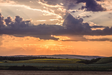 Sunset over fields in Romania