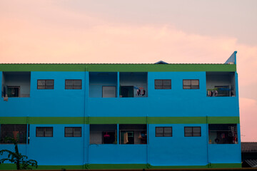 Apartment building in Thailand , Sky and cloud , Old apartment in the downtown of Pathum Thani Thailand ,