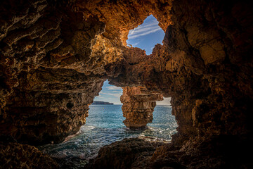 Natural cave on the coast in Spain, Benitatxell, Alicante, Cova dels Arcs