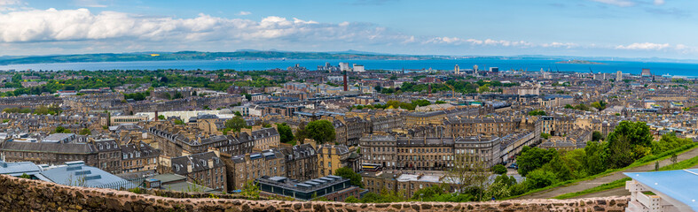 Fototapeta na wymiar A panorama view from the top of Calton Hill across the northern part of Edinburgh, Scotland on a summers day