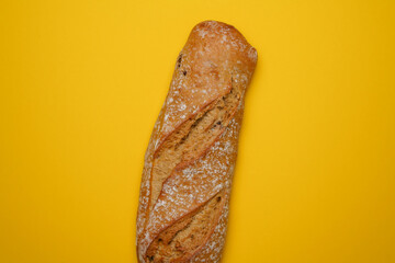 Crunchy French Baguette. Wheat bread isolated in bakery. Bake bread flat lay bun top down