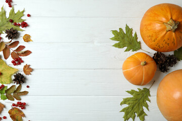 Fototapeta premium Thanksgiving Day composition with pumpkins on white wooden table