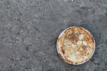 pancake dough product on a concrete background, top view. High quality photo