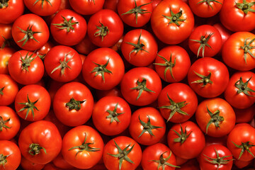 Ripe red tomatoes. Food background. Top view.
