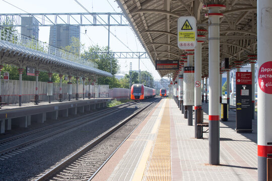 Russia, Moscow,  July, 13, 2021: Moscow Central Ring. Lastochka Electric train  at the Zorge station.