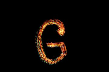 Letter G. Light painting alphabet.