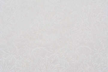 White lace work line with flowers and leaves, texture background.