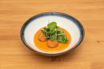 Spicy Red Curry Bowl with Peppermint, Spinach, Bean Sprouts and Breaded Pork Balls