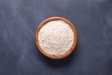 Baking or cooking background, flour on the dark background