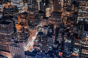 Bird eye view of illuminated Manhattan, New York City. 