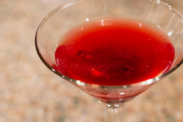Red Pomegranate Cocktail Drink in Martini Glass