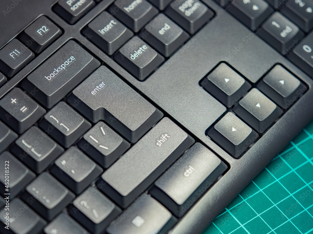 Poster black keyboard close-up. control and movement keys on the pc. backspace, enter, shift, delete and in