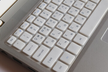 Detail of white keyboard keys of personal computer.