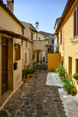 Fototapeta na wymiar A street in the historic center of Chiaromonte, a old town in the Basilicata region, Italy.