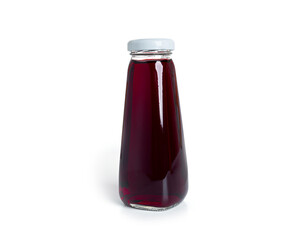 Cherry juice in bottle isolated on a white background.