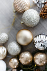 golden Christmas balls on the table. New Year's holidays.
