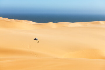 Orange sand dunes and clear sky in Namib desert