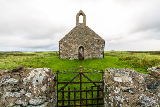 Small medieval Welsh Chapel in field, Anglesey.
