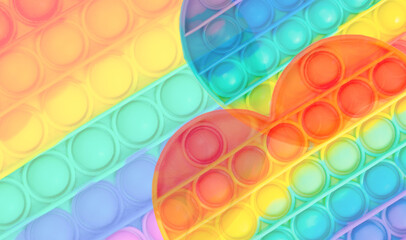 Multicolored rainbow touch toy pop it background - obrazy, fototapety, plakaty