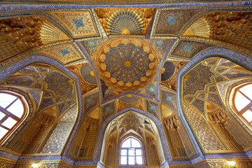 Fototapeta na wymiar Ceiling and architectural features of Aksaray Mausoleum in Samarkand, Uzbekistan
