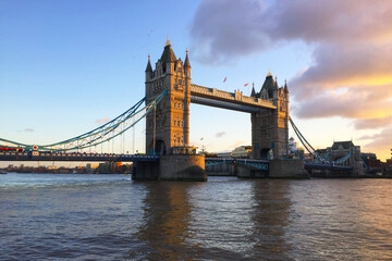 Fototapeta na wymiar The Tower of London Bridge on a slightly cloudy day.