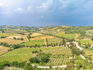 Siena, Italy - aerial panorama of the valleys and towns of the Crete Senesi in Tuscany