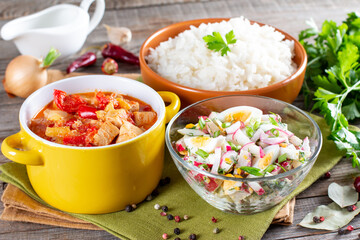 Three-course set menu for a nutritious healthy lunch. Three course set on a table in a business lunch, food set lunch. Full set of three dishes for lunch