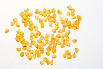dried chili pepper and pepper seeds on a white background