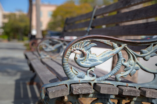 Ironwork on the armrest of a public bench in Downtown Charleston, SC.