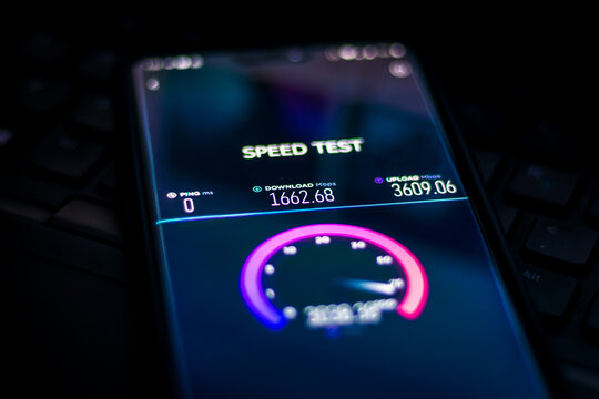 Speedtest on phone. 5G network test. Very fast internet. Testing speed of the internet connection.