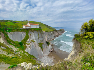 hermitage of San Telmo in Zumaia, Basque Country, Spain. With its rock formations called flysch.