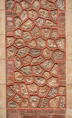 Close up of an old brick wall in Honfleur, France, for an abstract background texture.