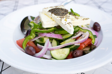Juicy Greek salad in a traditional Greek tavern