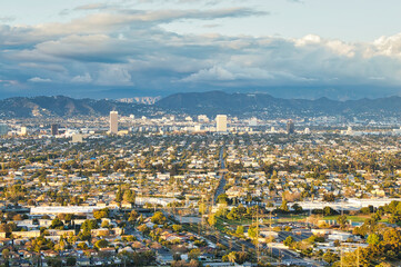 early morning veiw of a city skyline from high up on an overlook