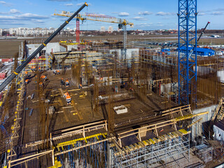 Fototapeta premium Construction site with unfinished building