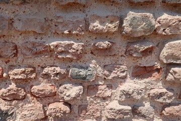 Various antique types of brickwork and white stone.