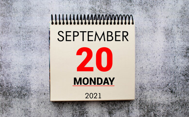 Wall calendar with a red pin - September 20