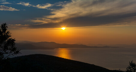 Beautiful sunset over Aegean Sea in Pelion Peninsula, Greece.