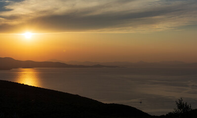 Beautiful sunset over Aegean Sea in Pelion Peninsula, Greece.