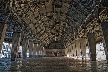 empty big hangar created with steel and glass