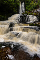 McLean Falls after heavy rain the waterfall is in full flow in the Catlins New Zealand