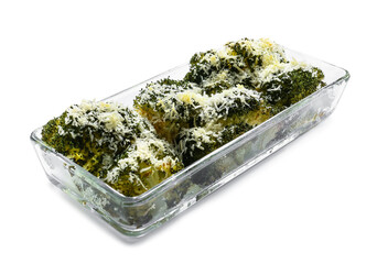 Baking dish with tasty broccoli and cheese on white background