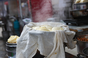 Chinese steamed buns stuffed or baozi in Dali market ,Yunnan China.