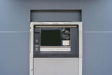 ATM drive through machine with blank screen at service station on inbound. Cash withdrawal with a...