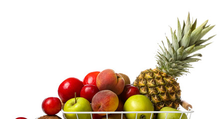 Basket with fresh fruits on white background